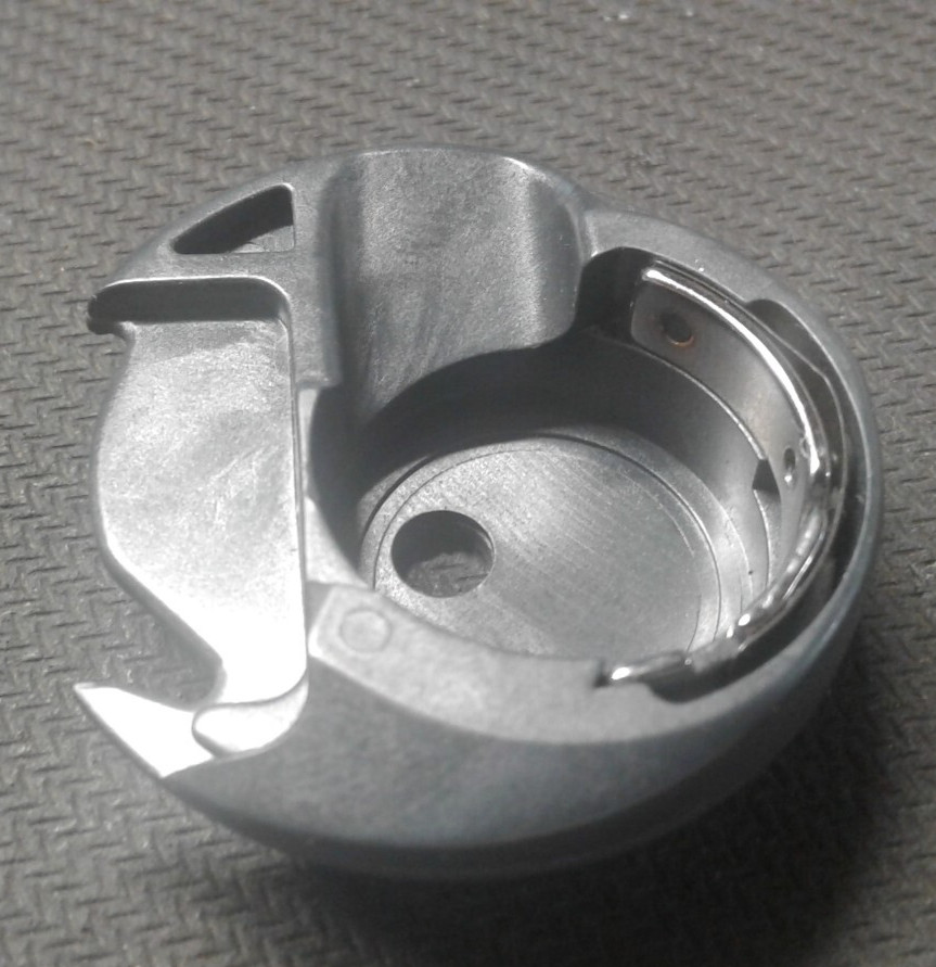 270 730149 single hole Bobbin Case Comp F/117