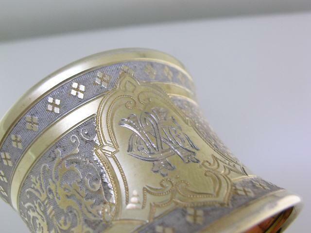 Decorative 800 Silver Napkin Ring w/ gold gilt finish & scroll patterns