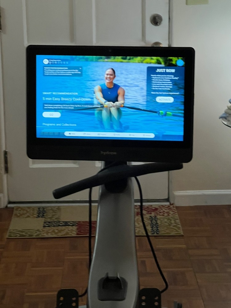 Hydrow Pro Rowing Machine with Immersive 22" HD Rotating Screen slightly used