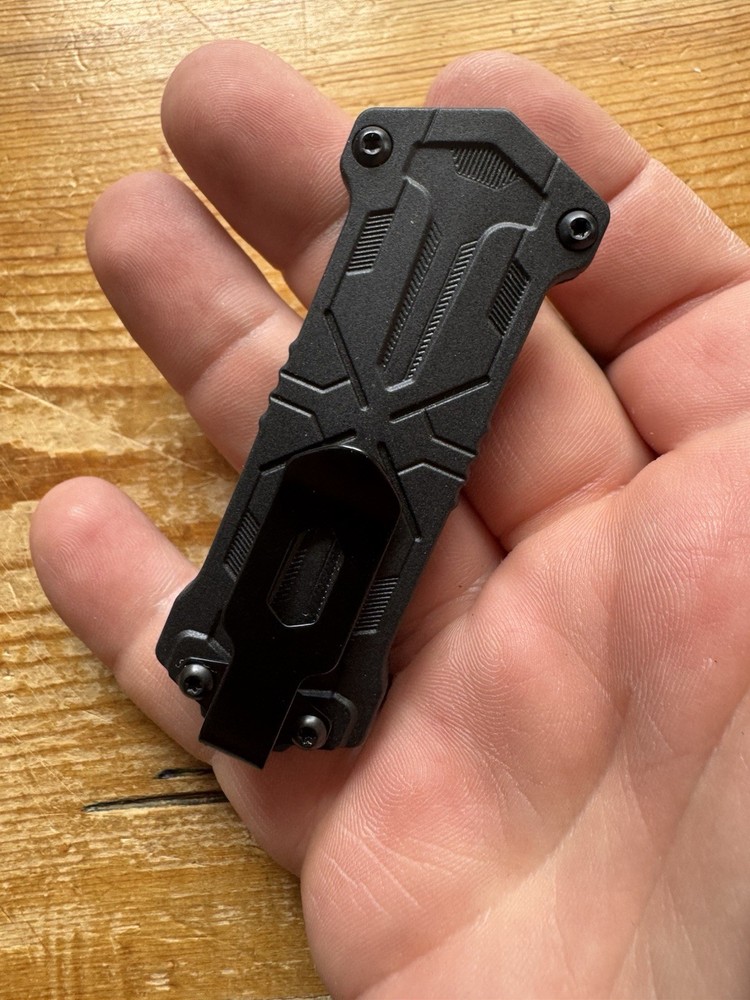 Kershaw Kapsule Manual Open Sliding Button Lock Single Edge Spear Point Blade