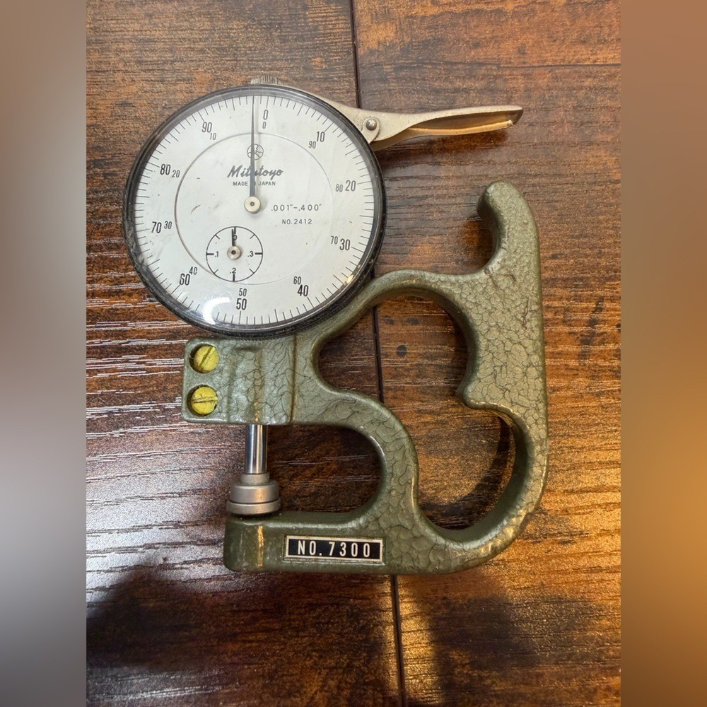 Mitutoyo 7300A Dial Thickness Gauge precision measuring tool.