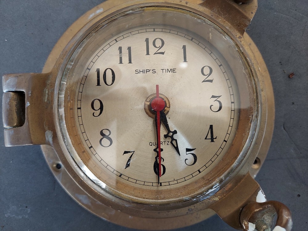 22GG58 NAUTICAL CLOCK, SOLID BRASS, NEEDS CLEANING & POLISHING, IS MISSING ONE