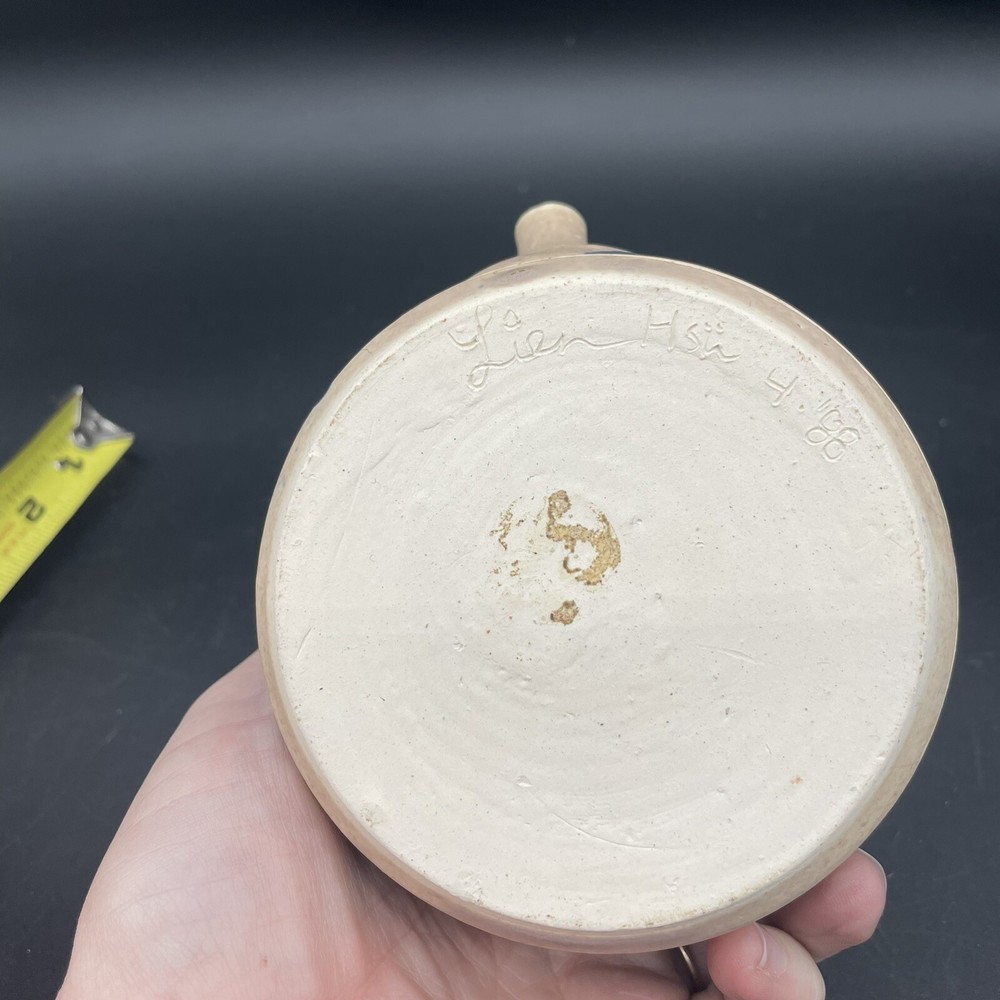 Small Tea Pot Blue & White Pottery w/ Yarn Handle.