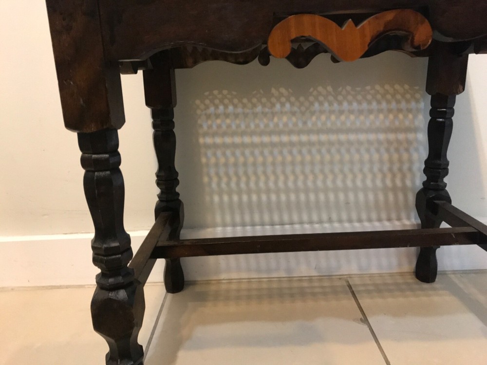 Caned-top footstool, ottoman or seat.