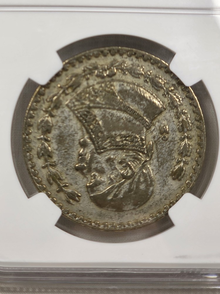1961 Mo Mexico Silver Un Peso, NGC Genuine.