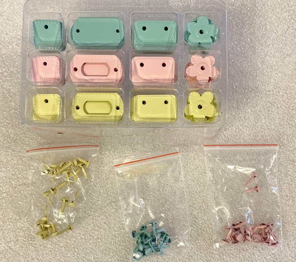 48 Unique FOLDING Brad Shapes-3 Diff Colors ,4 Diff Shapes. 36 Brads+ Storage -