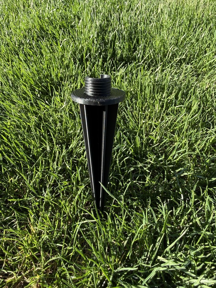 Universal landscape lighting stake