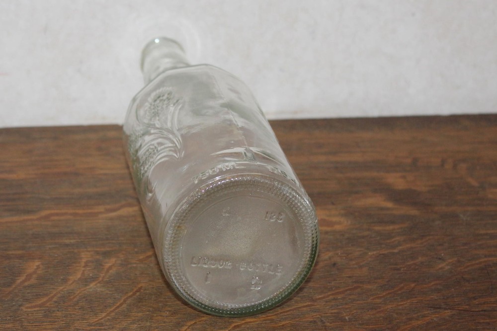 Vintage Liquor Clear Embossed Bottle