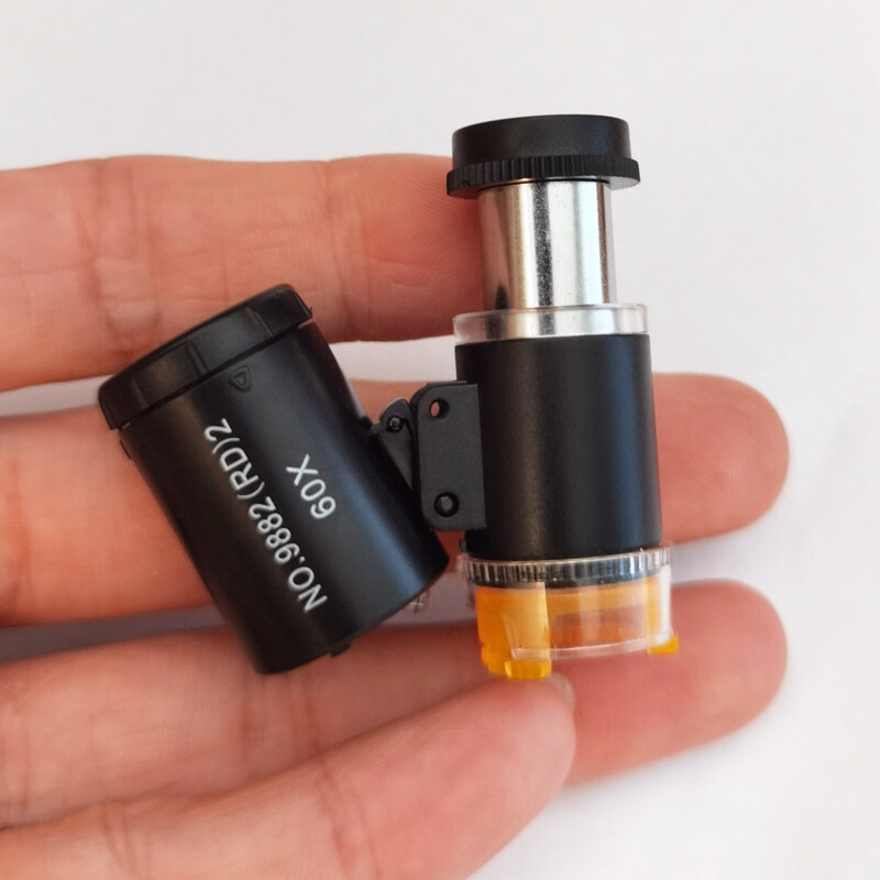 60X Black LED UV Light Illuminated Pocket Microscope Loupe Magnifier document