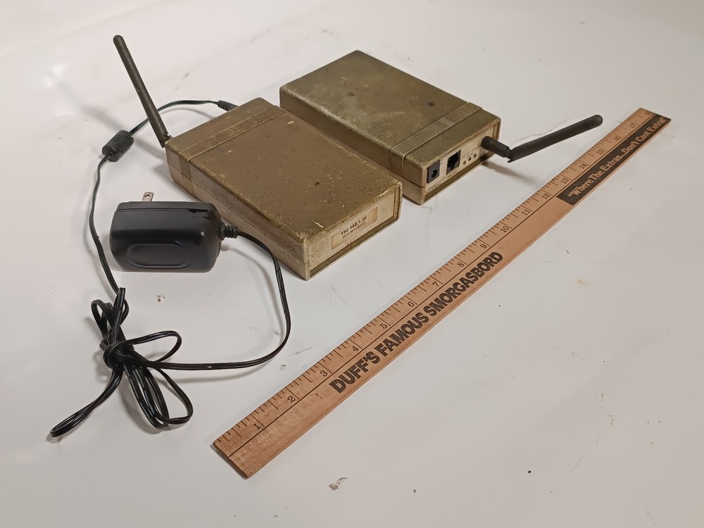 Pair of xlConnect Network Devices, Likely Wireless Access Points, 1 Adapter