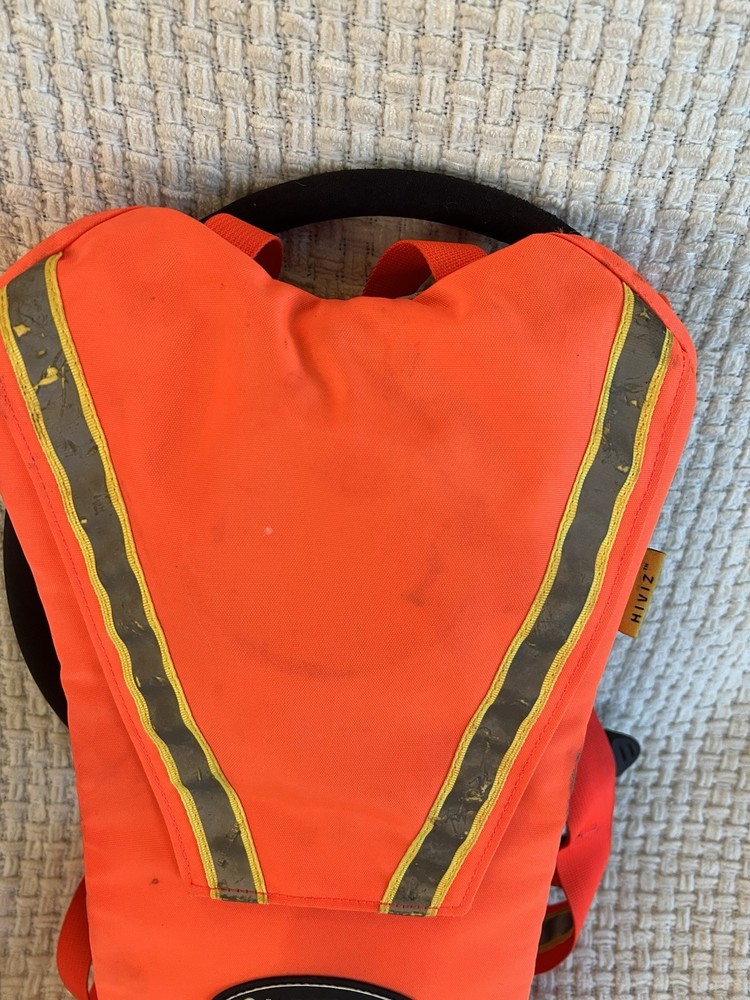 CamelBak Hi-Viz Hydration Pack Includes Cleaning Kit Orange W/ Reflective Strips