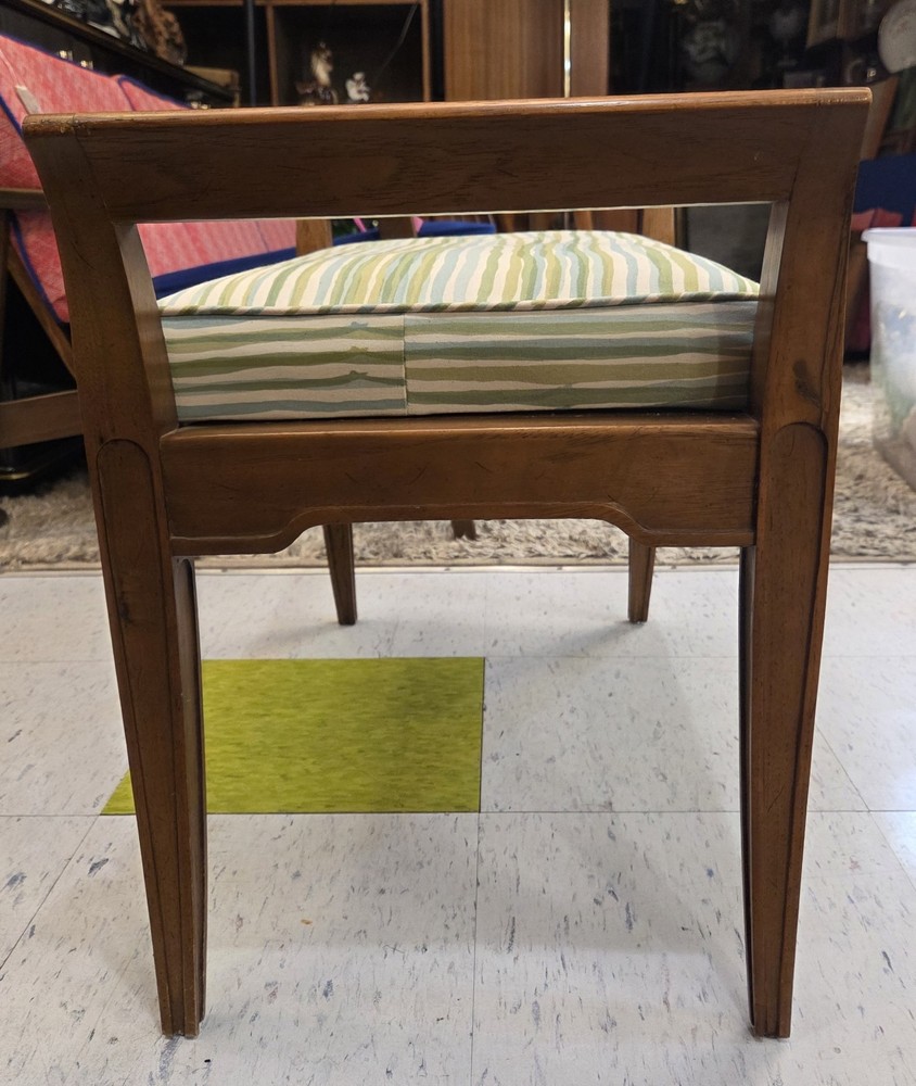 Vintage 1950s walnut bench, professionally upholstered.
