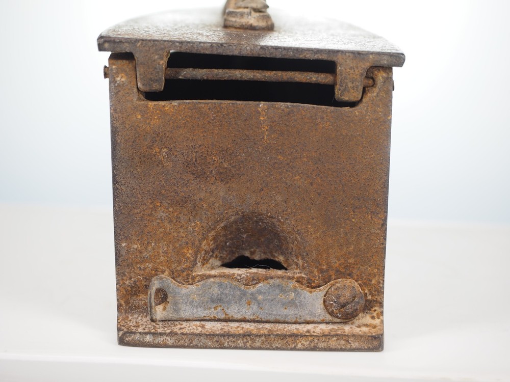 Antique cast iron coal fired clothing iron