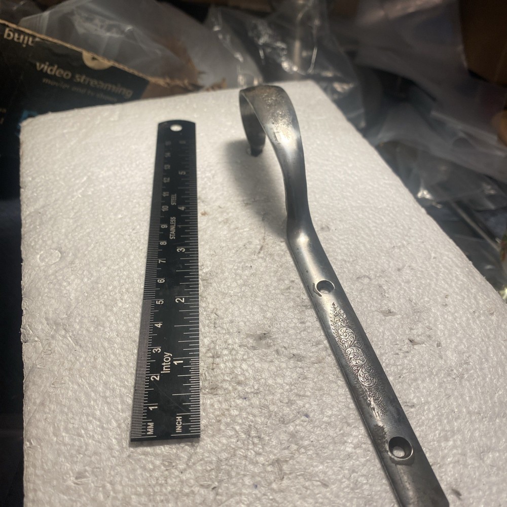 Silver Trigger Guard Of Unknown Brand.