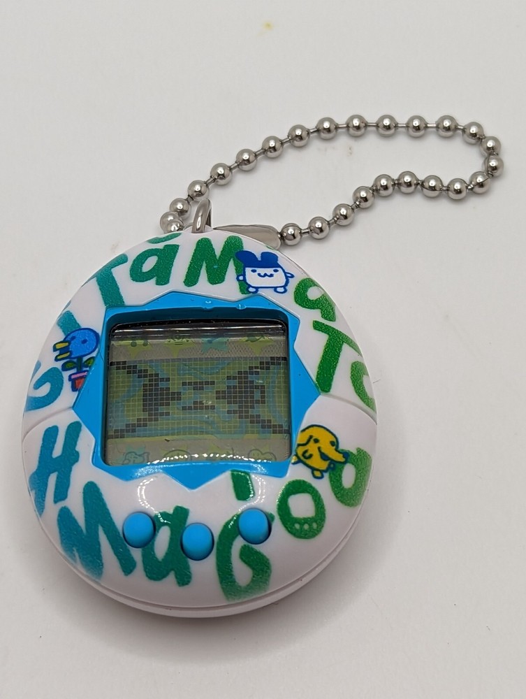 2017 Tamagotchi 20th Anniversary Celebration Edition Repeating Logo Tested Works