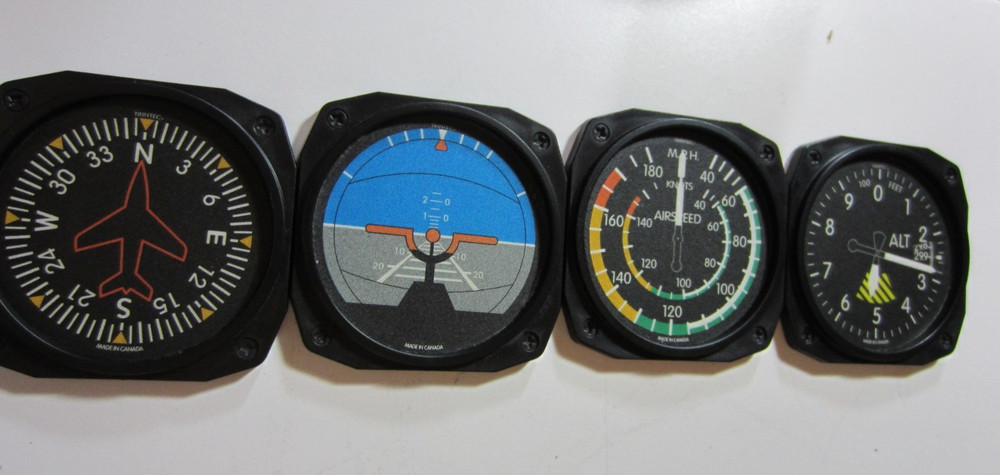 4 TRINTEC AVIONICS AIRPLANE COASTERS PRE-OWNED MADE IN CANADA