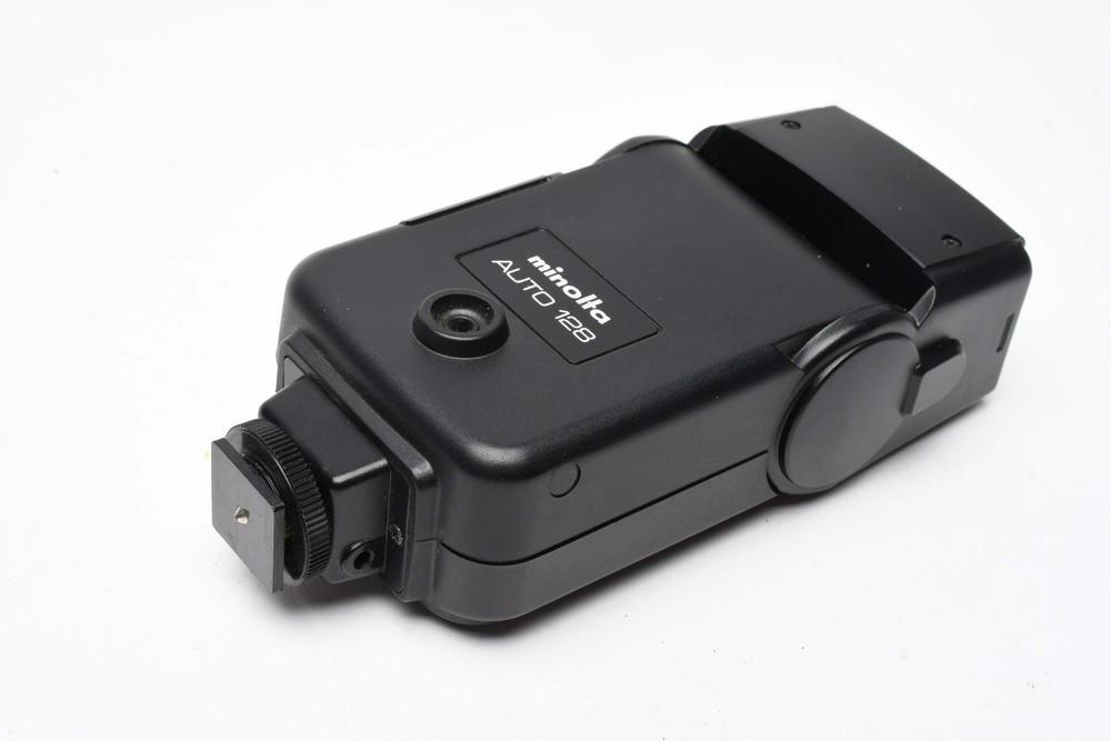 Minolta Auto 128 electronic flash, nice & clean, tested, w/Case+Manual