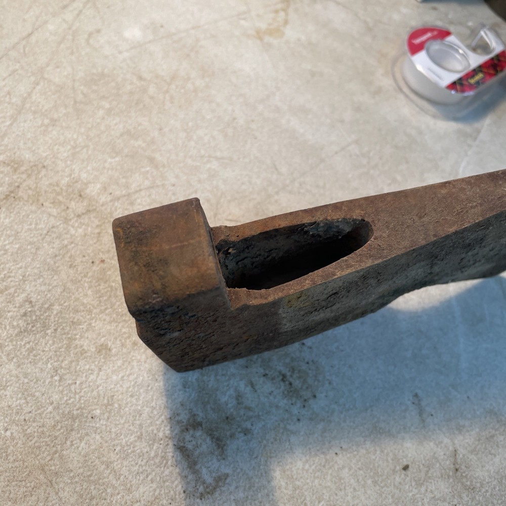 Vintage axhead with tool holder