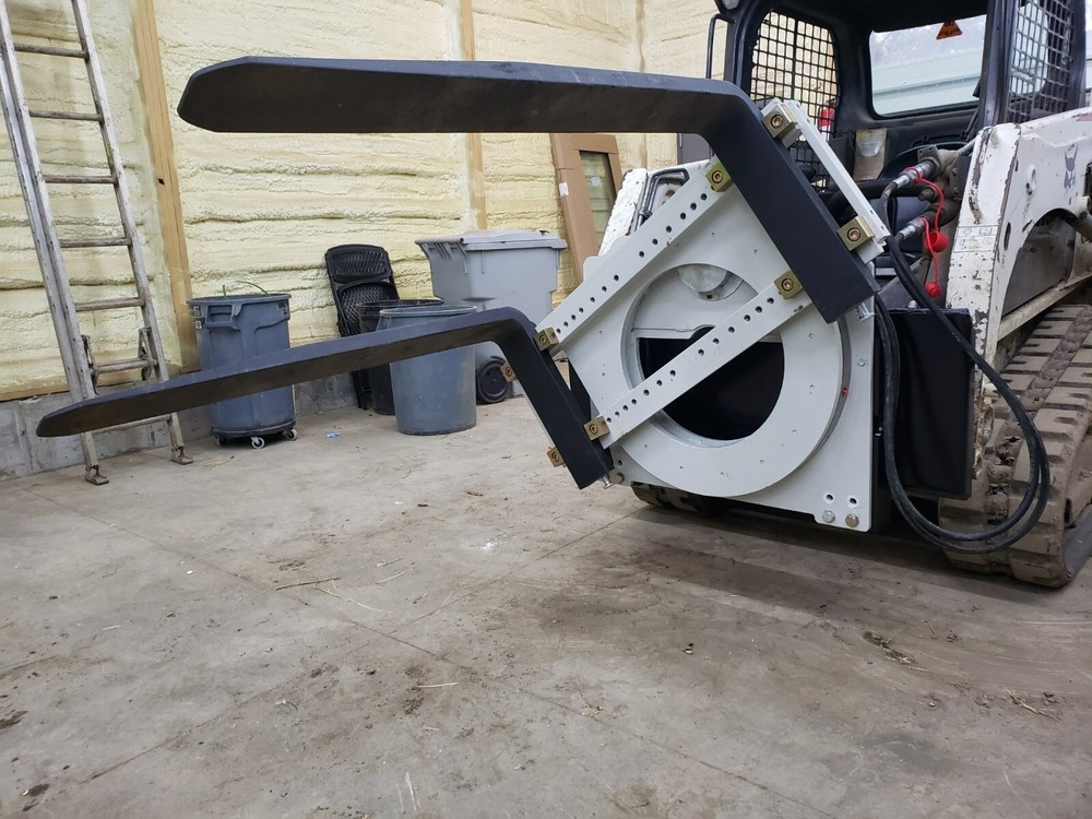 Skidsteer Bobcat fork rotator--- NEW WITH WARRANTY!!!