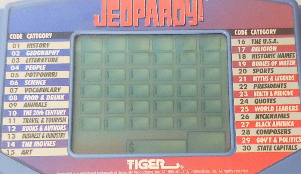 Jeopardy Handheld Electronic Game Complete with Answer/Question Book & Cartridge