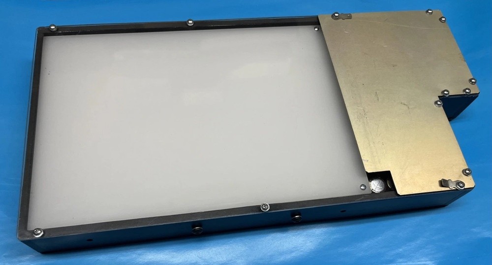 Electronic Chips Inside Testing Light Box For Perhaps Plastic Bottles Integrity.