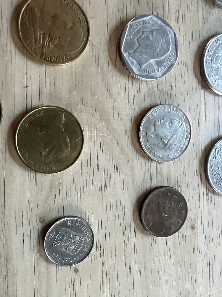 Assorted foreign coins. 26 Coins In Total