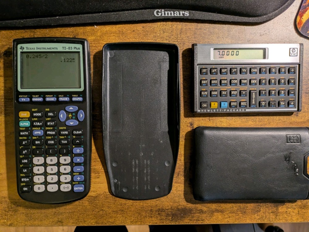 Texas Instruments TI83 Plus And Hewlett-Packard 11c