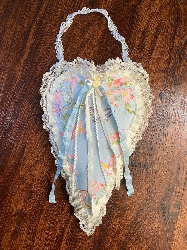 Beautiful long hanging heart with pocket.