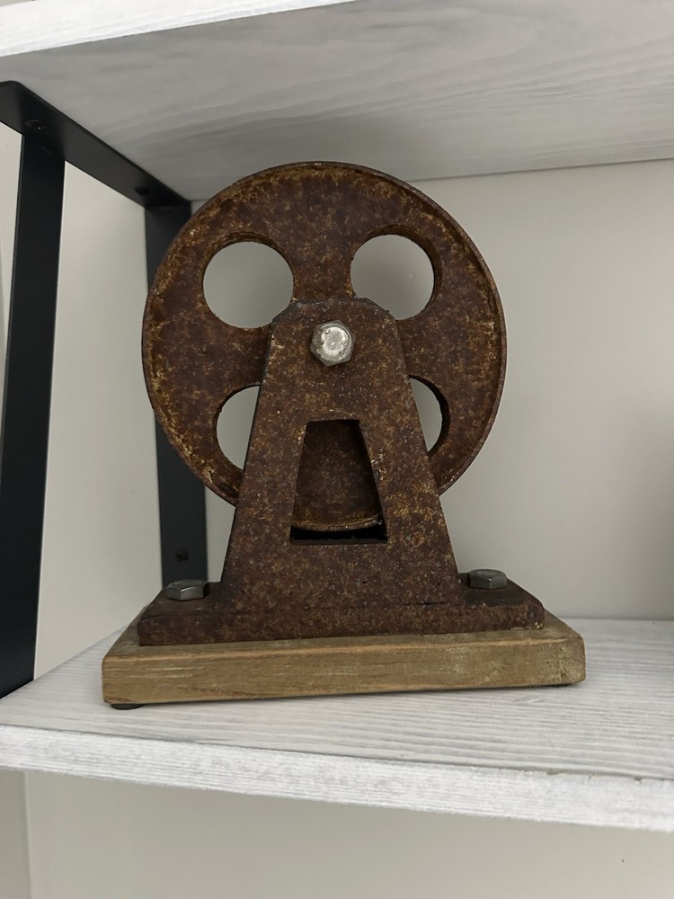 metal wheal on Wooden Base