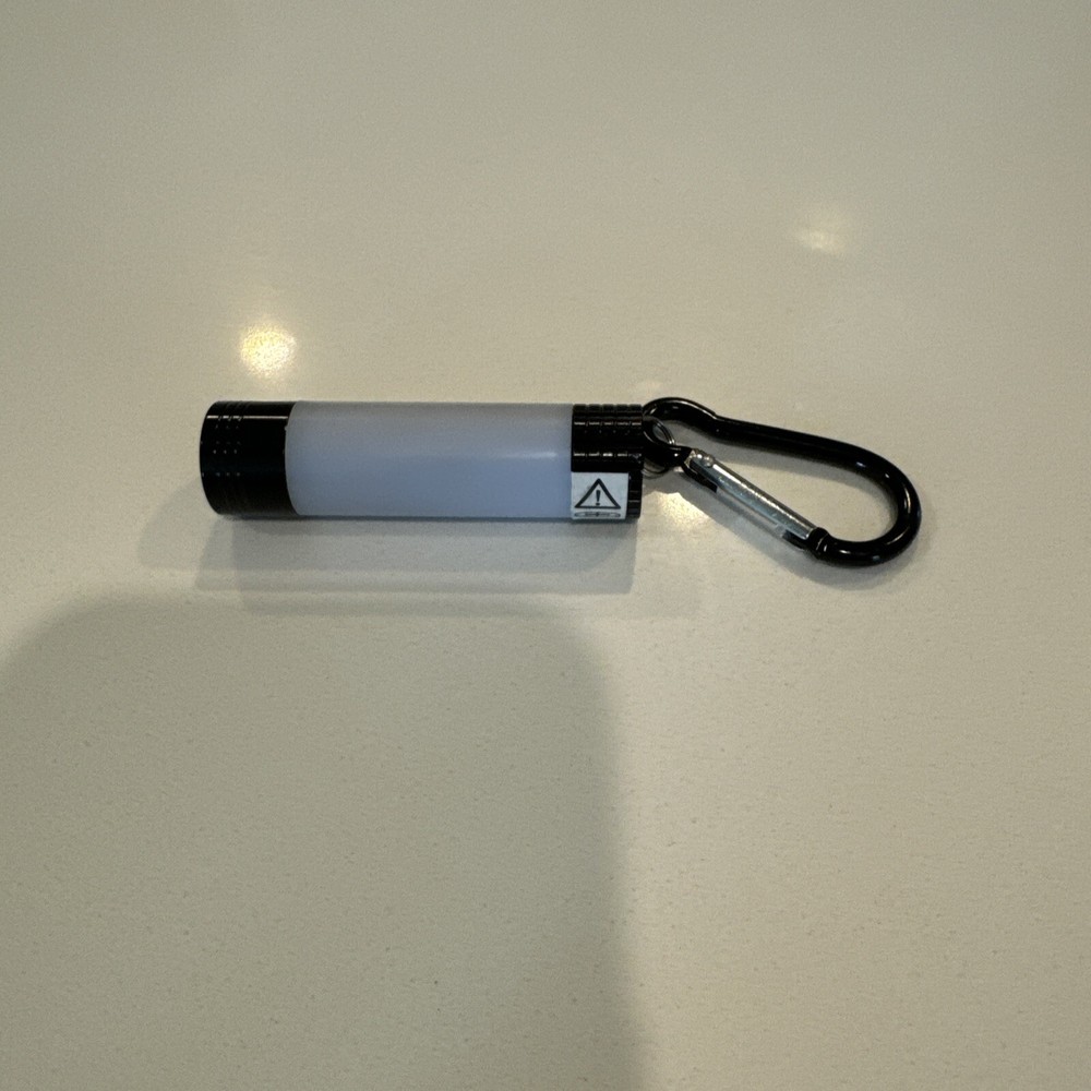 NYCC 2024 Britbox “The Passenger” Comic Con Exclusive Flashlight Keychain