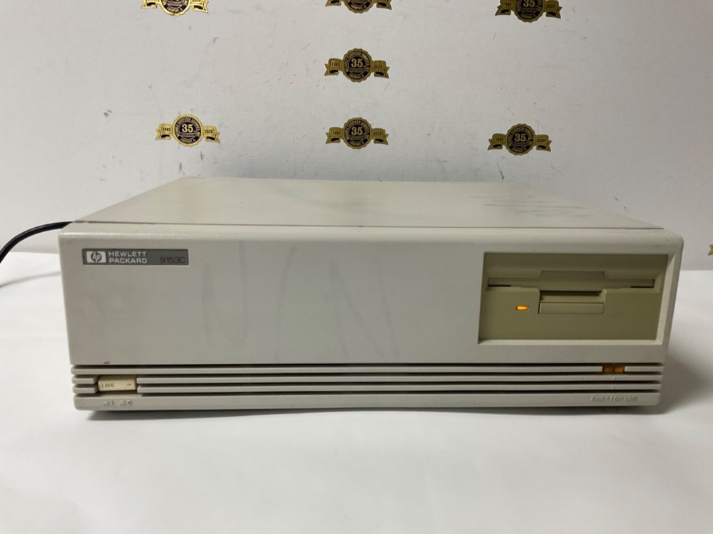 Hewlett Packard 9153C Workstation drive box Floppy Powers up