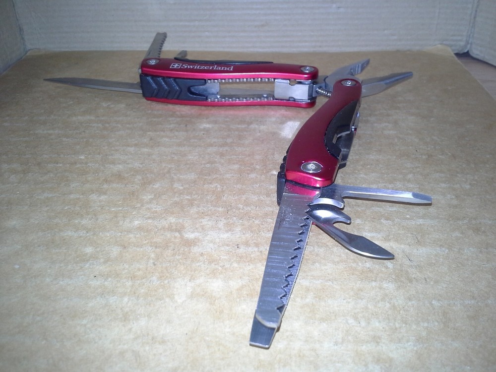 Switzerland Red Multitool Folding Pocket Pliers. VGC