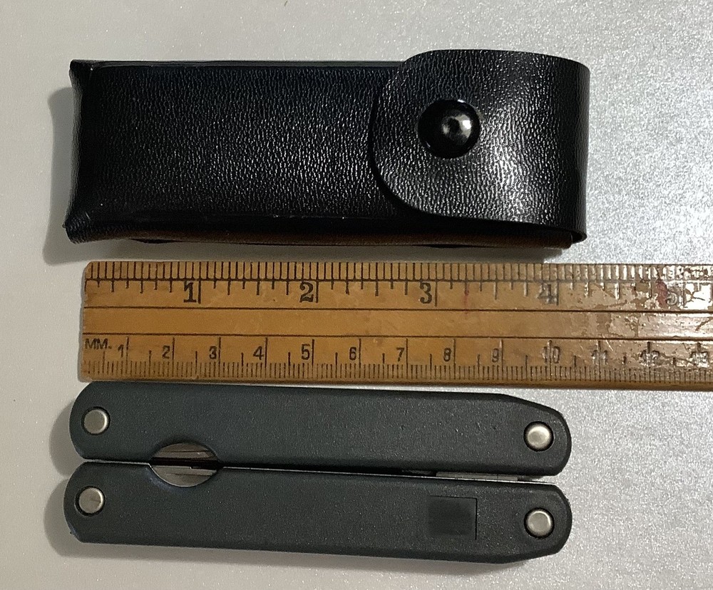 SALE $8 Multitool 8 Function Black Handle Not Branded In Case