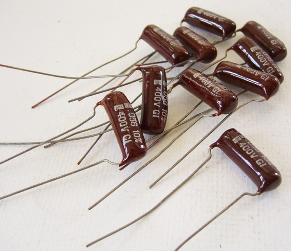 4 NOS Radial Capacitors .056 uf 400v