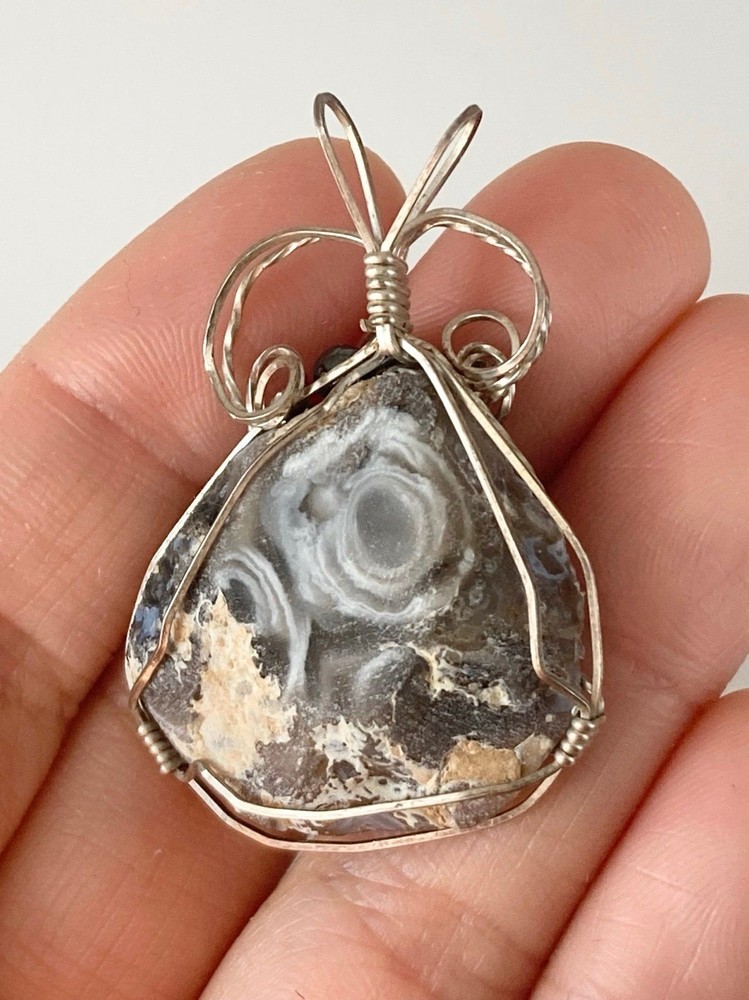 Handcrafted silver wire geode agate pendant