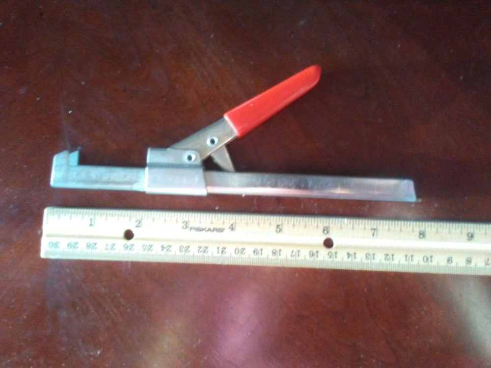 Swing-A-Way jar opener