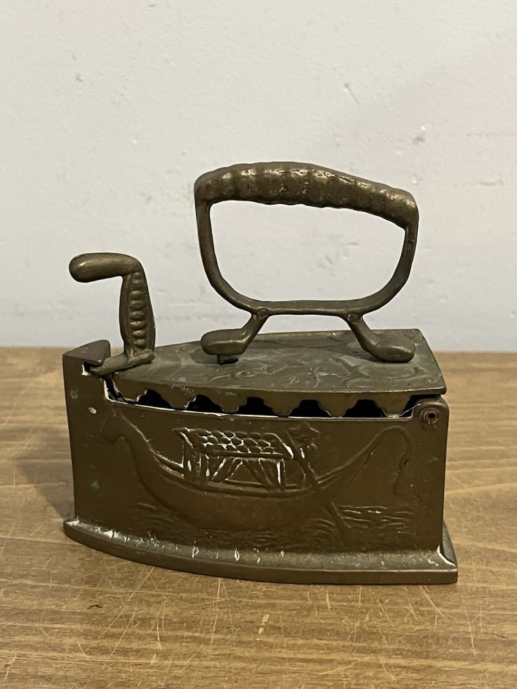 Vintage Embossed Brass Sad Iron