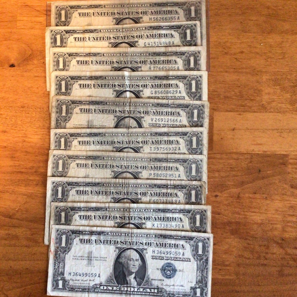 10 Quanity 1957 one dollar silver certificate circulated