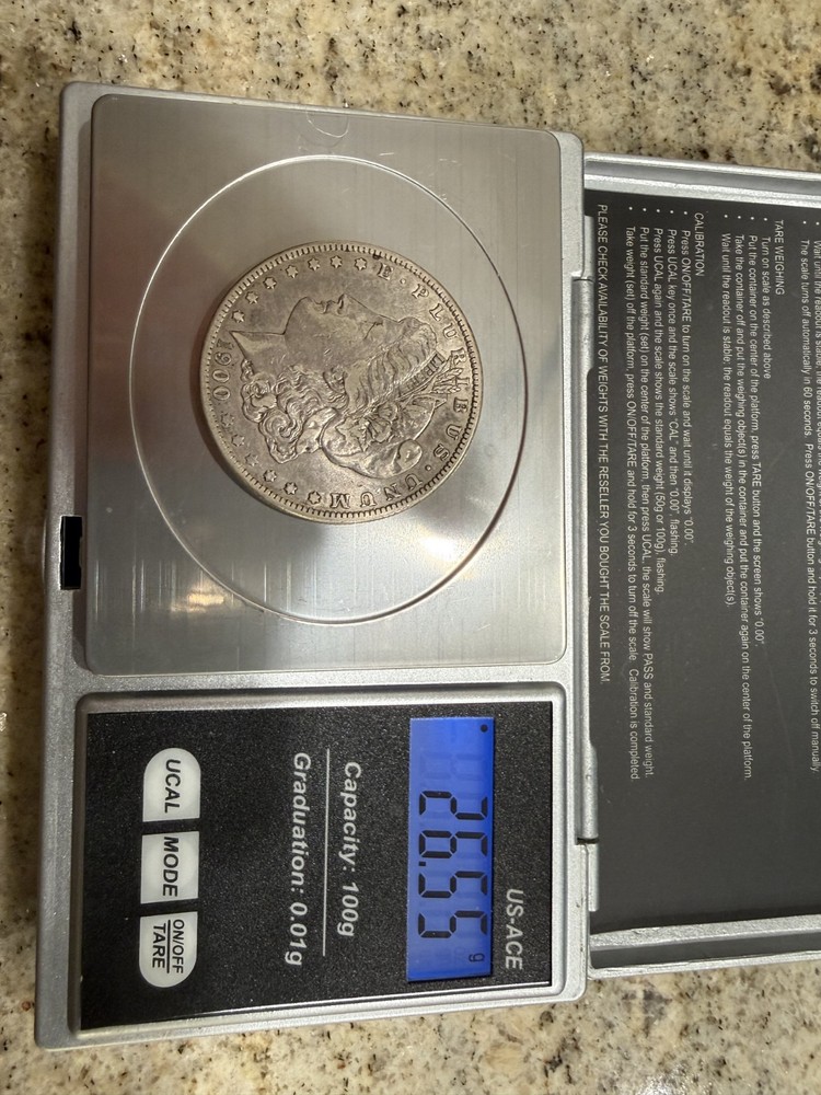 1900- O Morgan Silver Dollar