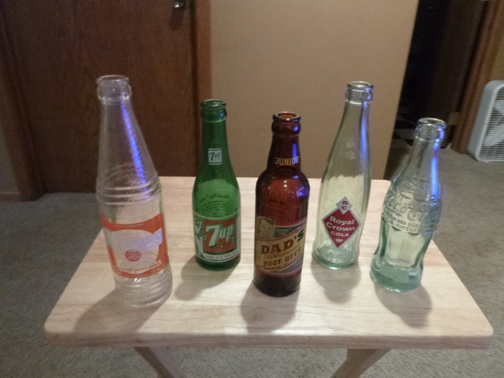 FIVE NICE VINTAGE POP BOTTLES