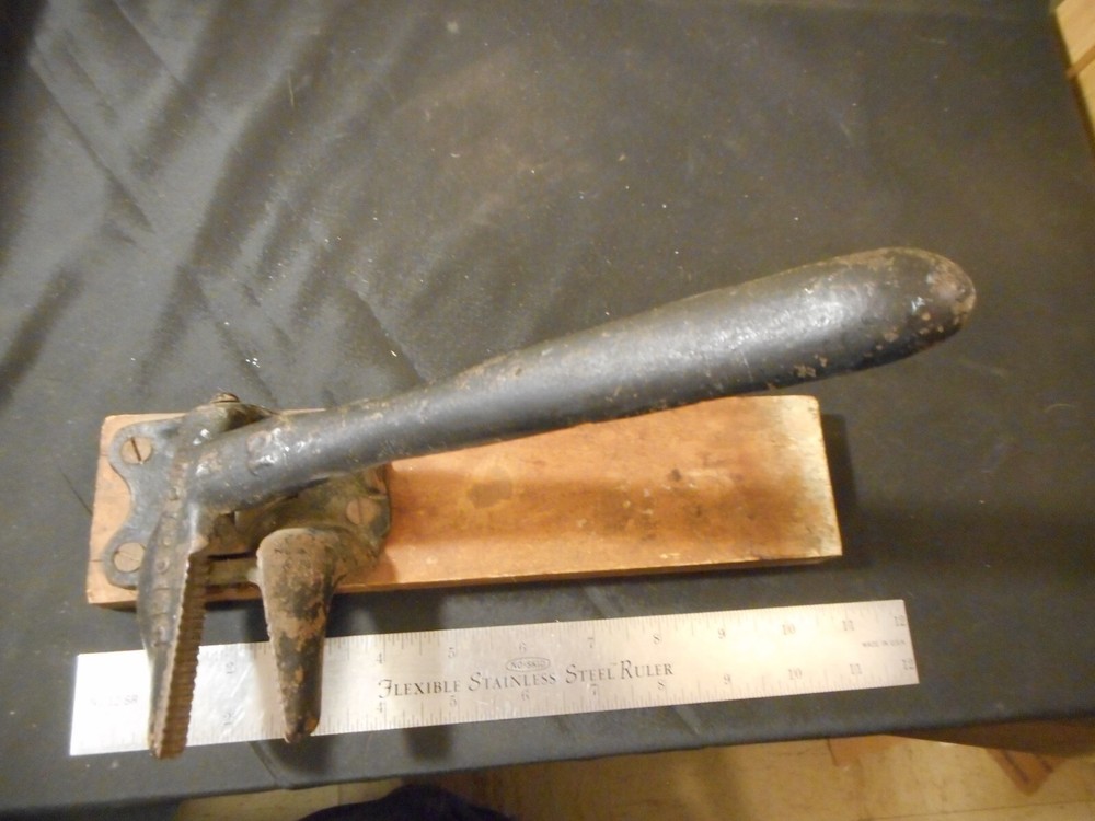 antique Brighton cast iron spring loaded nut cracker marked 10