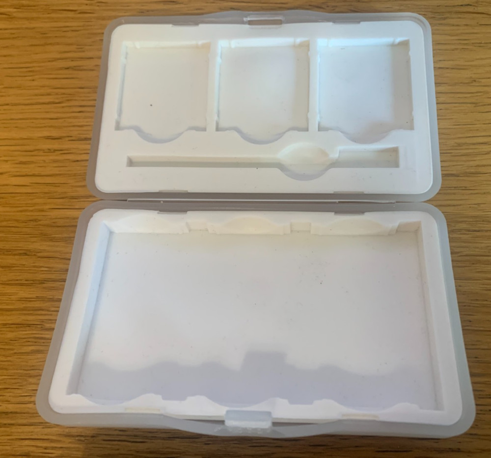 - Holds 3 Games and Stylus - White