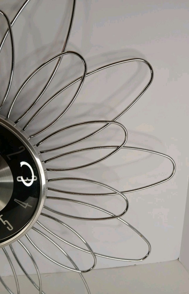 Mid Century Modern Starburst Silver and Black Wall Clock