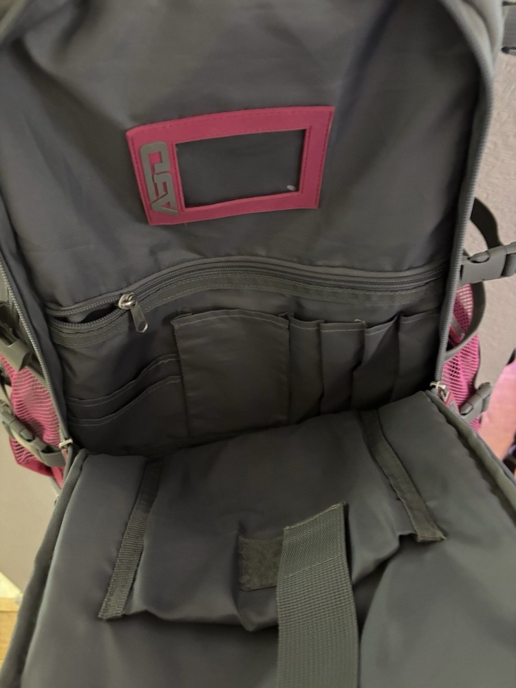 Large softball backpack 2 bats Backpack bag. Excellent Condition. Grey-pink.