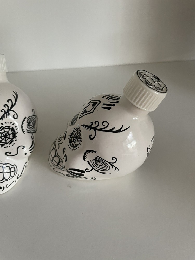 Empty 2 Sets of Kah Tequila White and Black Skull Containers
