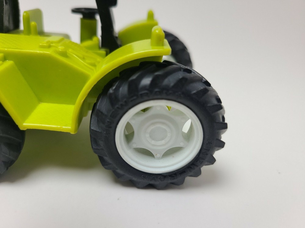 New Ray Green Dumping Tractor