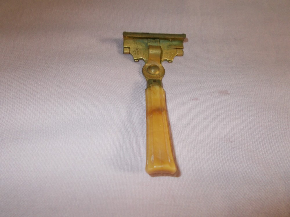 Vintage Schick Razor With Bake Lite Handle Metal Brass
