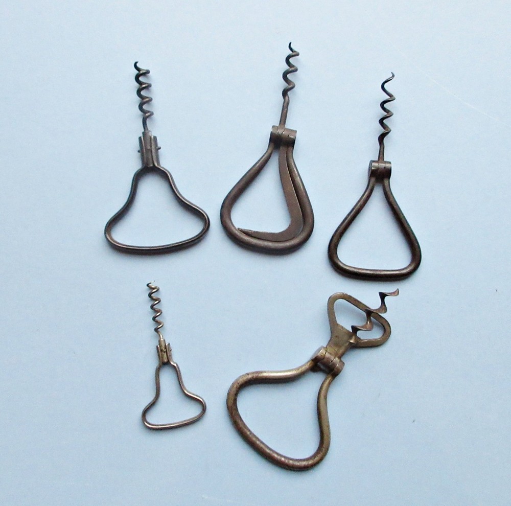 Five antique bow (aka: harp) corkscrews