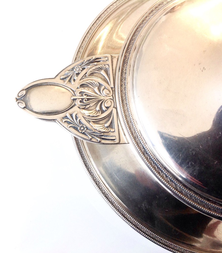 AN ANTIQUE SMALL SOLID SILVER WARMING DISH OR SAUCE BOWL PRODUCED BY WOLFERS