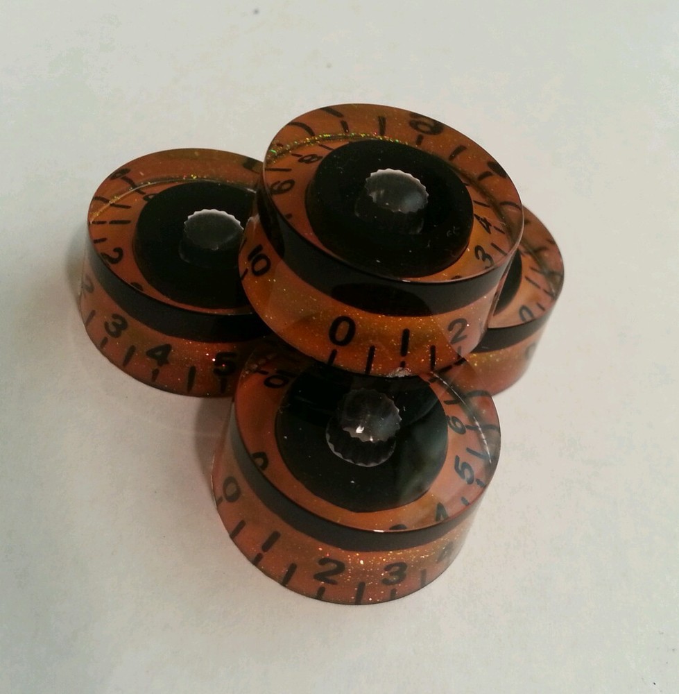 4 Guitar speed volume / tone knobs 0-11. Black/Orange. JAT